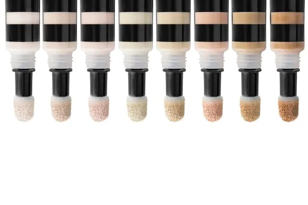 A set of different color correcting products (concealers, creams, sticks) displayed on a table, each labeled with its color and intended use, such as green for redness, peach for dark circles, and lavender for dullness.