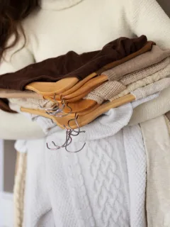 woman dealing with her Seasonal Wardrobe Transition.