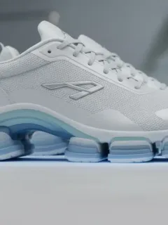 Ergonomic athletic shoes demonstrating advanced foot support and cushioning