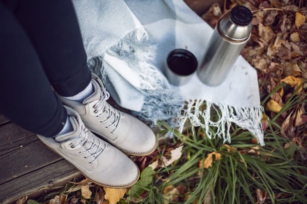 Adidas sneakers are drying on a shoe rack with newspaper inside, while a bottle of leather conditioner sits nearby. A window shows overcast German weather.