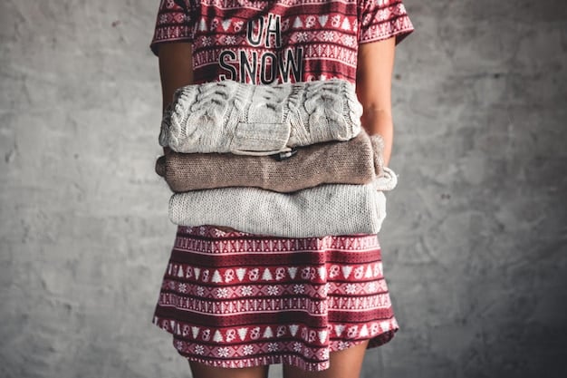 A person is layering different pieces of clothing on top of each other: a thermal base layer, a SHEIN knit sweater, a scarf, and a winter coat. The focus is on how the pieces fit together without looking bulky.