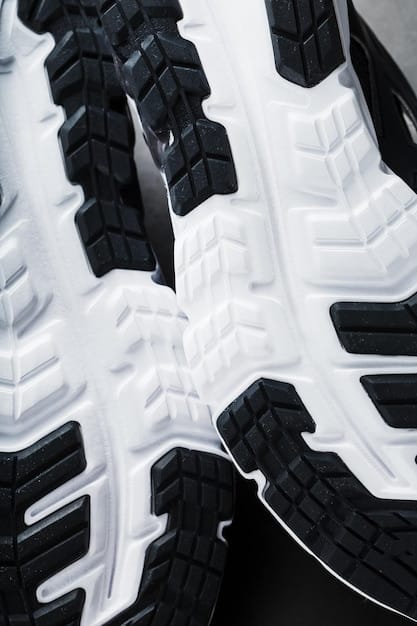 A close-up shot of the sole of the new Nike running shoes, highlighting the advanced cushioning technology. The image showcases the intricate design and materials used for shock absorption and energy return.