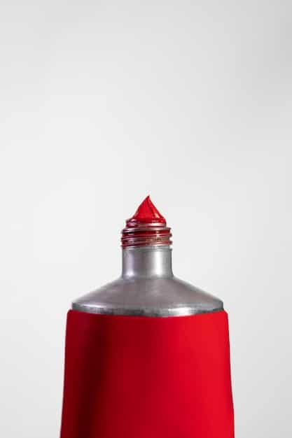 A macro shot showing the nozzle of a German perfume bottle. The nozzle is made of high-quality metal and its mechanism is finely designed. The focus is on the seamless connection between the pump and the bottle.