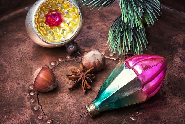 An artistic shot featuring spices like cinnamon, cloves, and vanilla beans, alongside a perfume bottle with an ornate design, capturing the essence of oriental fragrances.