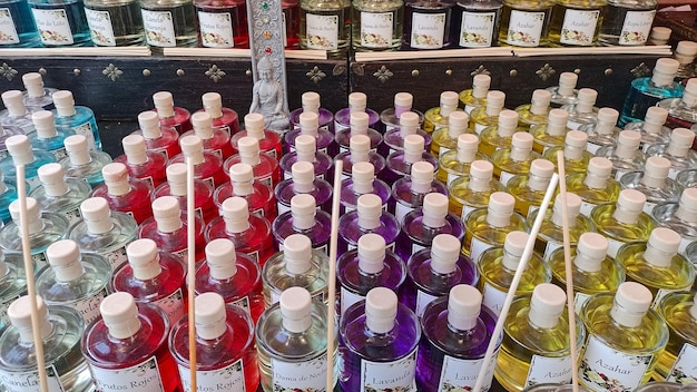 A well-organized display inside a German niche perfume boutique, featuring several perfume bottles from a specific house, like Humiecki & Graef or biehl. parfumkunstwerke. The display includes informational cards about each fragrance, highlighting their unique notes and the perfumer's inspiration.