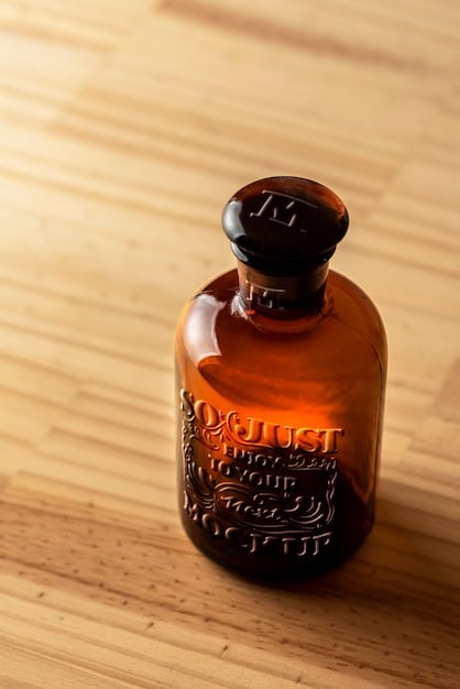 A close-up shot of a bottle of 4711 Eau de Cologne, showcasing its iconic label and traditional design, placed on a wooden table with historical artifacts related to perfume making in Cologne.