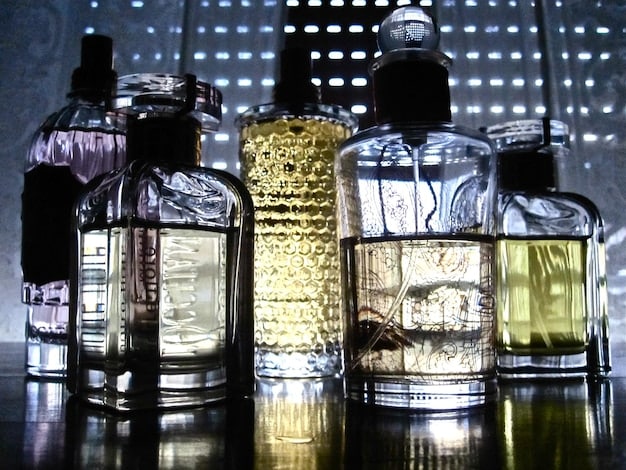 A close-up shot of different perfume bottles arranged against a backdrop that transitions from a winter scene (snowy trees) on one side to a summery scene (lush greenery) on the other, symbolizing the seasonal changes in Germany.