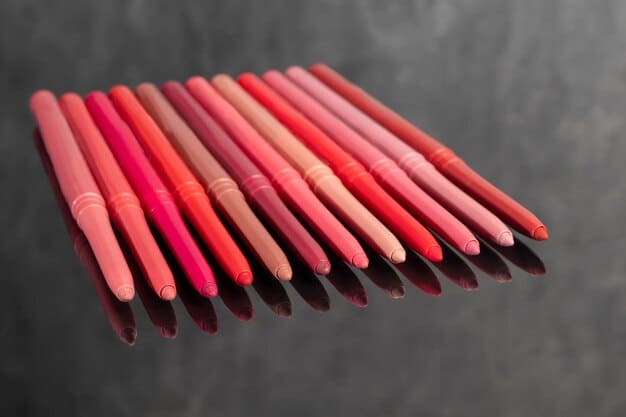 A display of various lip liners in different shades from nude to dark red, showcasing the range of colors available for creating fuller lips. The liners are neatly arranged on a makeup counter with good lighting.