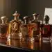 Collection of vintage and luxury perfume bottles, symbolizing investment in fine fragrance for 2026.