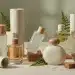 Collection of sustainable fragrance bottles with natural elements, highlighting eco-friendly perfume choices.
