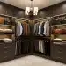 Luxury walk-in closet with classic apparel items retaining value